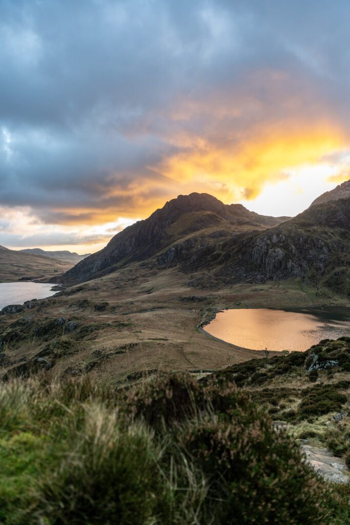 Golden sunrise glow above Tryfan in the Snowdonia mountain range