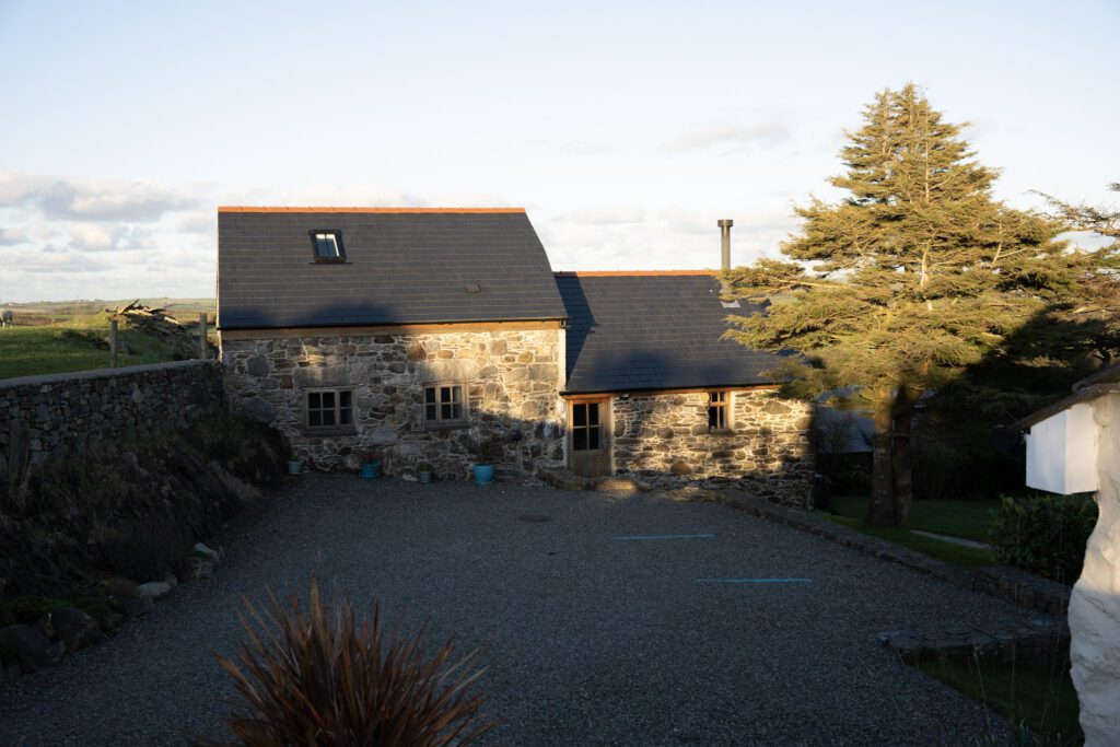 Exterior of stone barn conversion, 2 bedroom holiday cottage and driveway