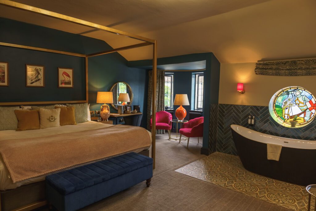 The stunning suite room at The George, Hathersage with a super king bed and amazing bath