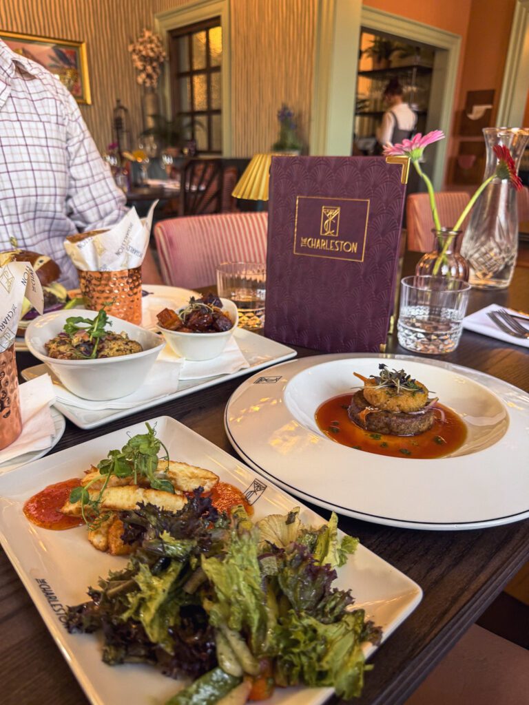 A selection of food dishes from The Charleston including a burger, halloumi and fries