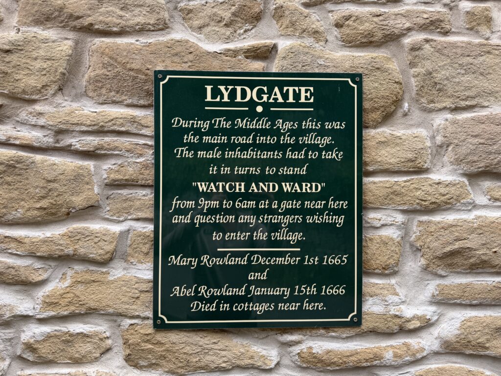 Plaque in Eyam village telling people what this area in the village was used as during the plague.