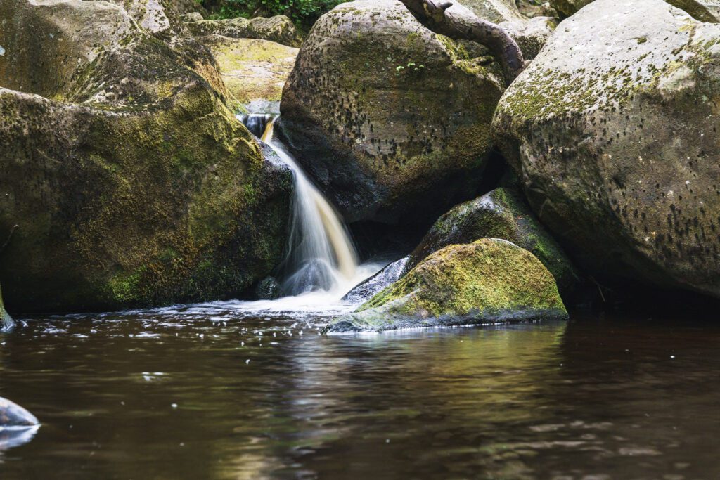 Water running over the rocks at Padley Gorge