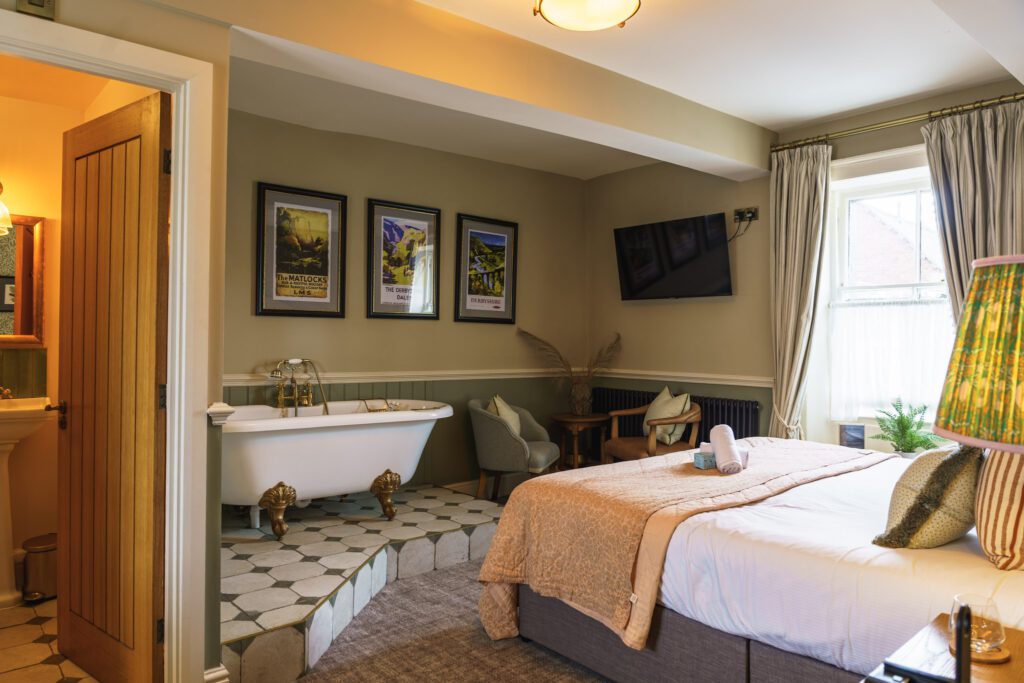 Suite at the Ashford Arms looking across the bed towards the bath