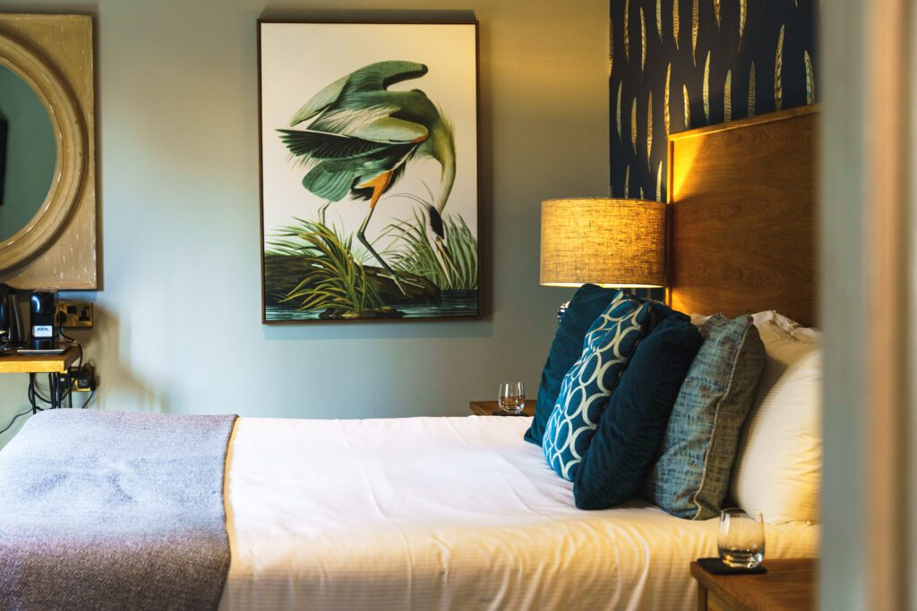 King sized bed at The Maynard with modern decor