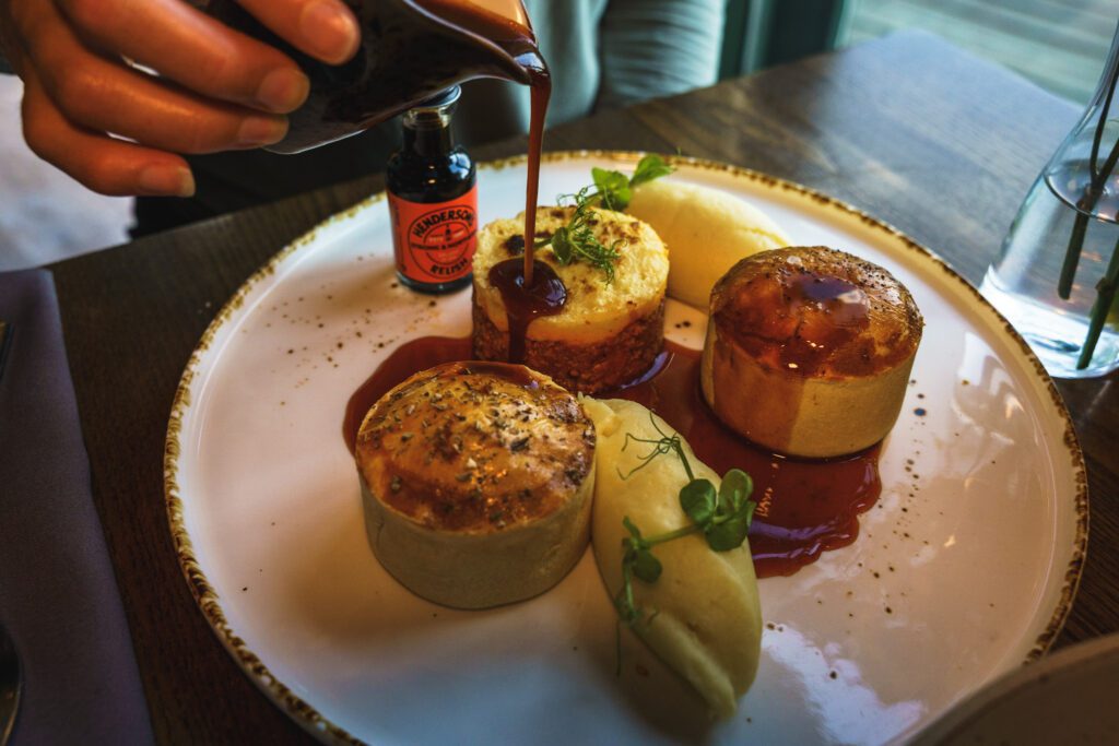 Trio of mini pies, Lamb, Beef and a shepherds pie, mash, jus & Hendersons relish