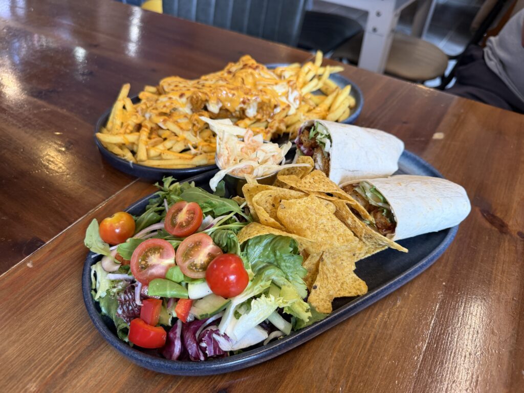 Lamb and Flag food, loaded fries and a wrap