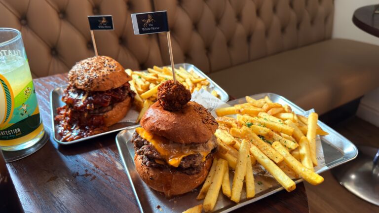 The White Horse burgers and fries on a tray