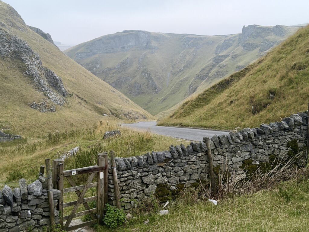 Looking down into Winnats Pass from a footpath gate